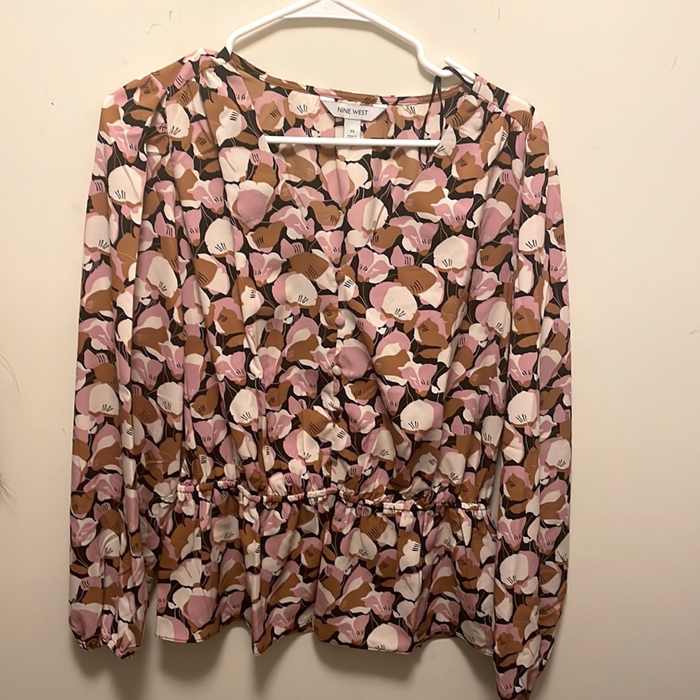 Nine West 100% polyester long synched sleeve dress shirt.